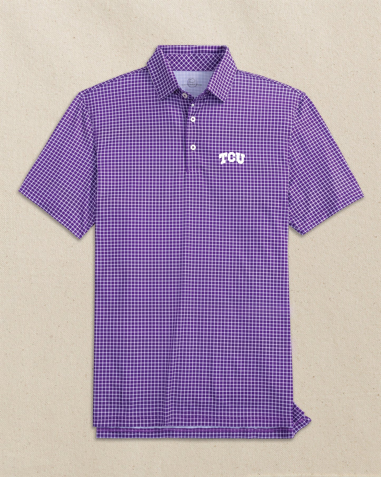 The front view of the Southern Tide TCU Horned Frogs Driver Dunes Edge Plaid Polo by Southern Tide - Regal Purple