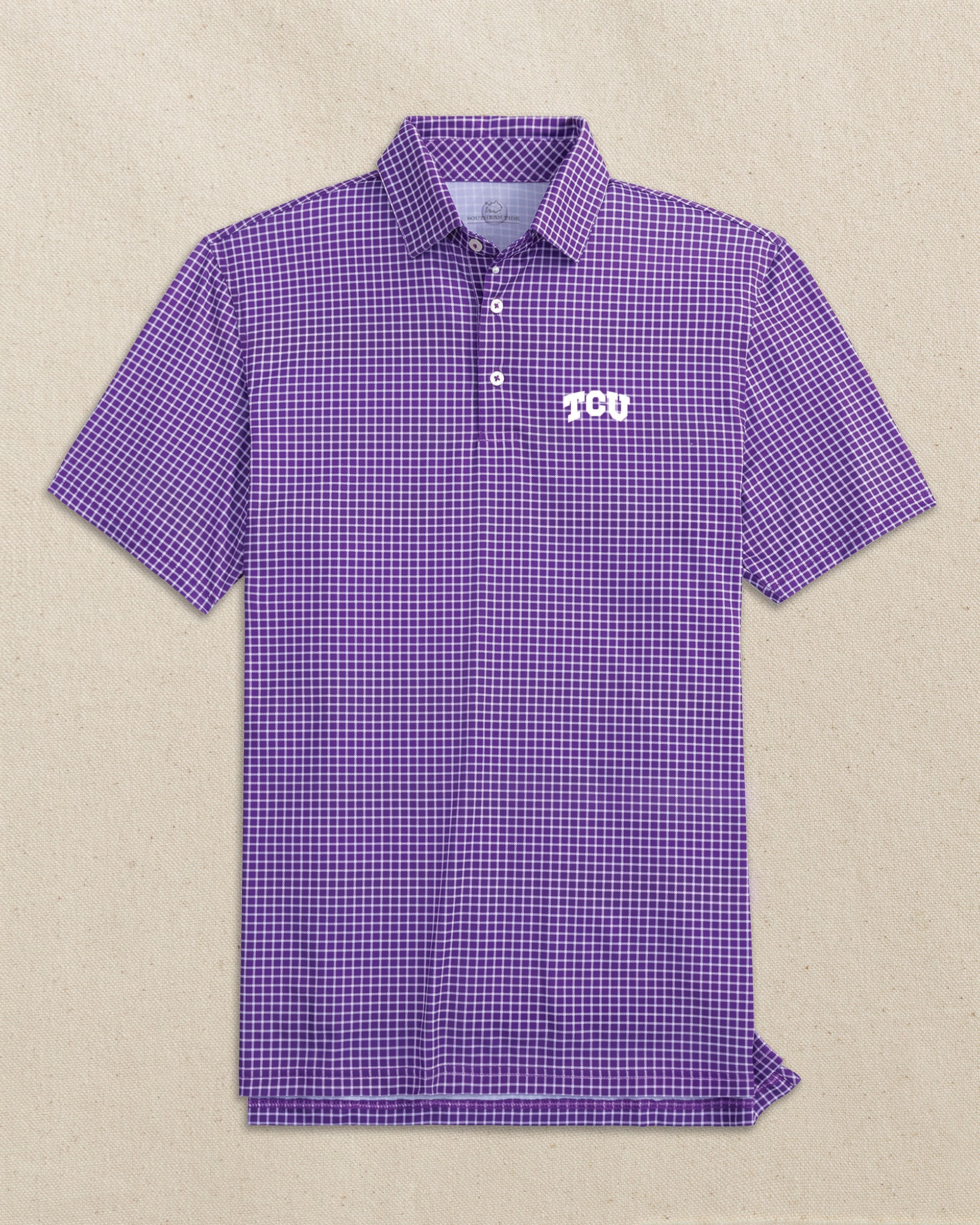 The front view of the Southern Tide TCU Horned Frogs Driver Dunes Edge Plaid Polo by Southern Tide - Regal Purple